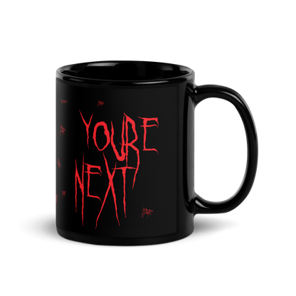 Back View 11 oz Black mug with red text 'YOU'RE NEXT'
