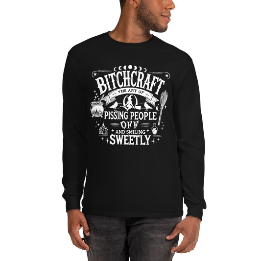 Front View: Person Wearing a Black Long Sleeve Shirt With a Witchy Graphic Text: Bitchcraft: Pissing People off  and smiling Sweetly Sizes: Small to 4XL