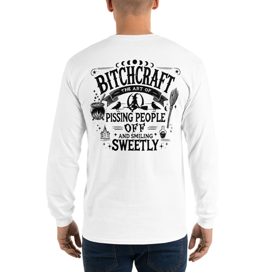 Back View: Person Wearing a White Long Sleeve Shirt With a Witchy Graphic Text: Bitchcraft: Pissing People off  and smiling Sweetly Sizes: Small to 4XL