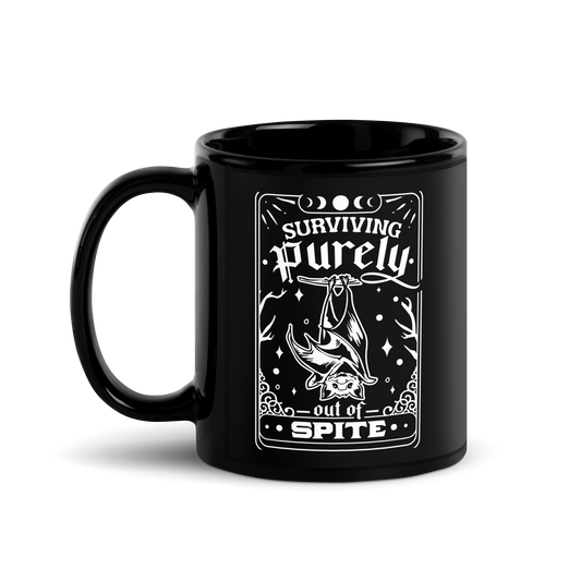 11 oz Black Mug with a hanging bat with the text: Surviving Purely out of Spite